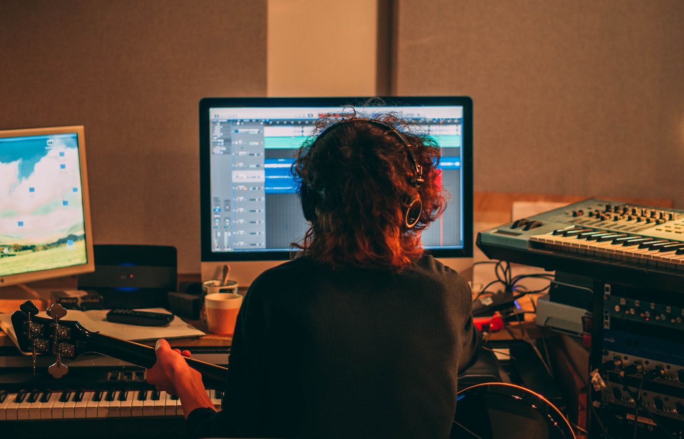 Music producer working on rights-protected release assets